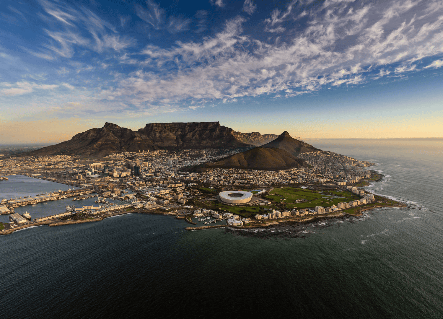 Aerial view of Cape Town coastline and Table Mountain.