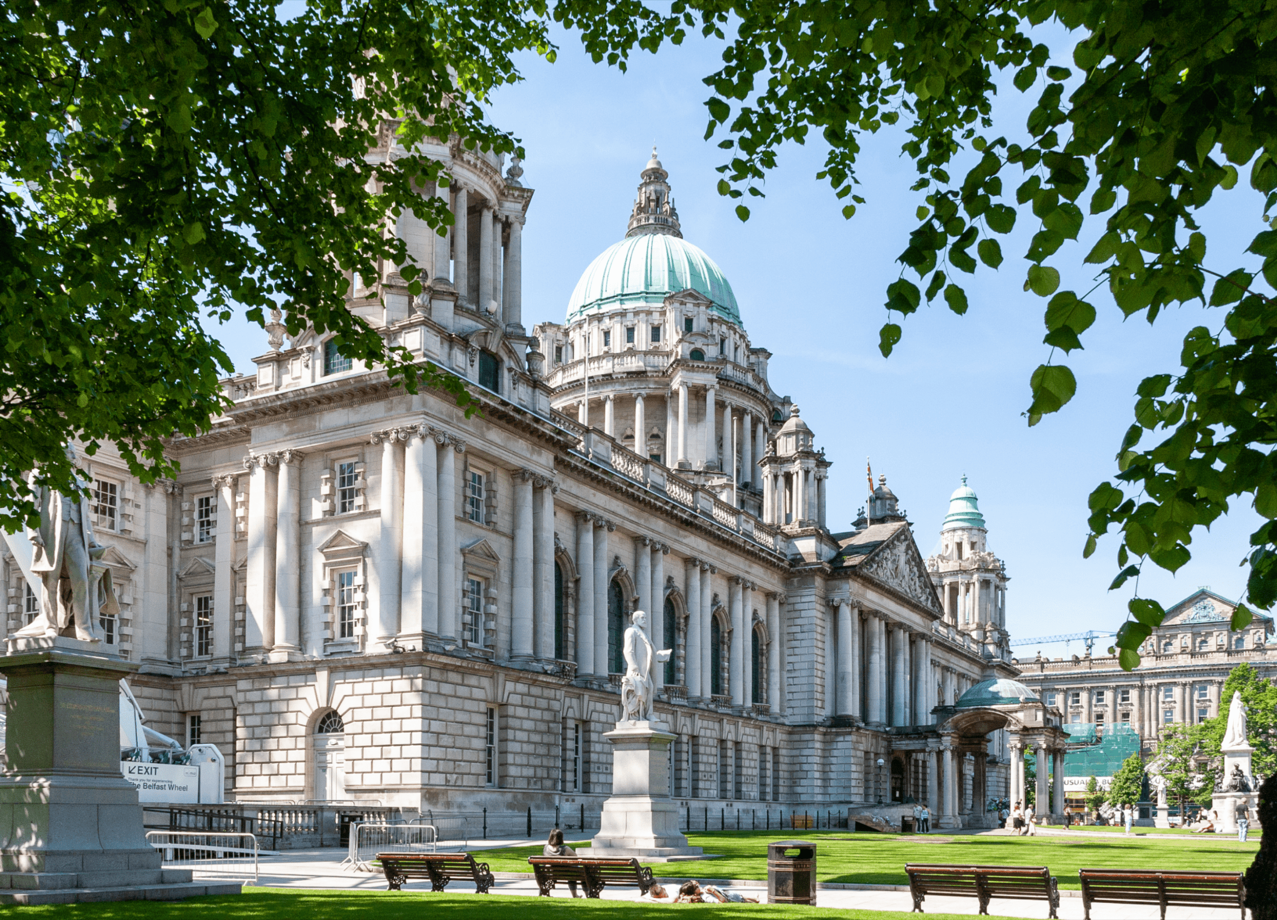 Belfast City Hall in sunny garden setting.