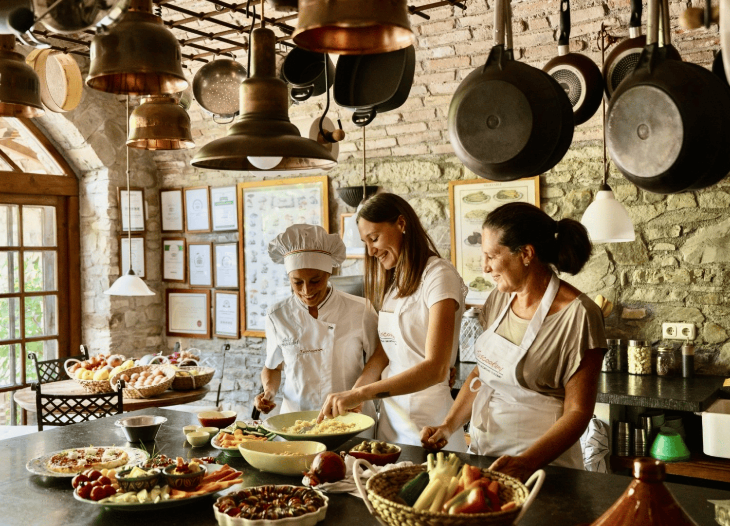 Women cooking together in rustic kitchen setting.