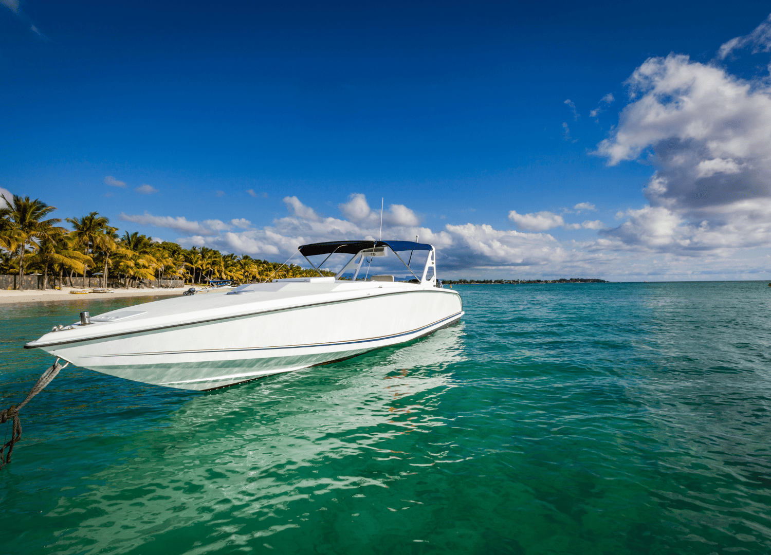 White boat on tropical turquoise sea