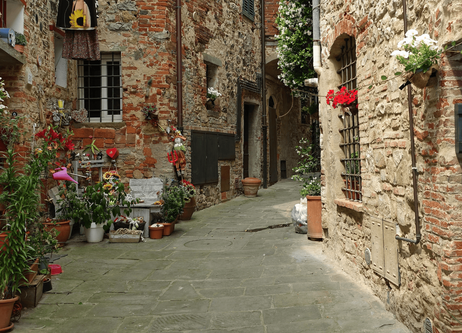 Charming narrow alley with rustic brick walls